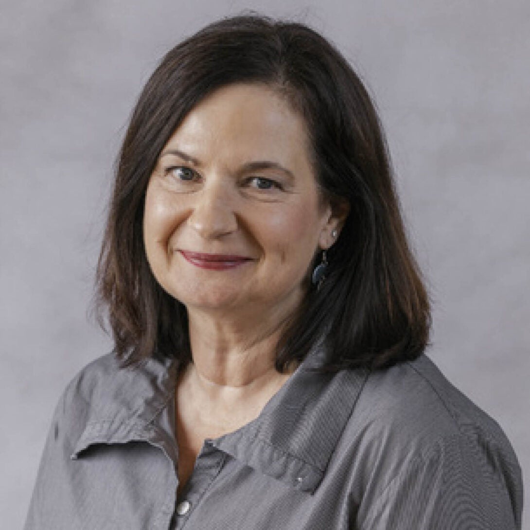 UIC Clinical Assistant Professor Barbara Glondys smiles at camera