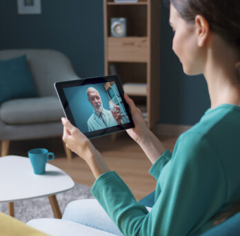 Patient uses mHealth to interact with clinician 